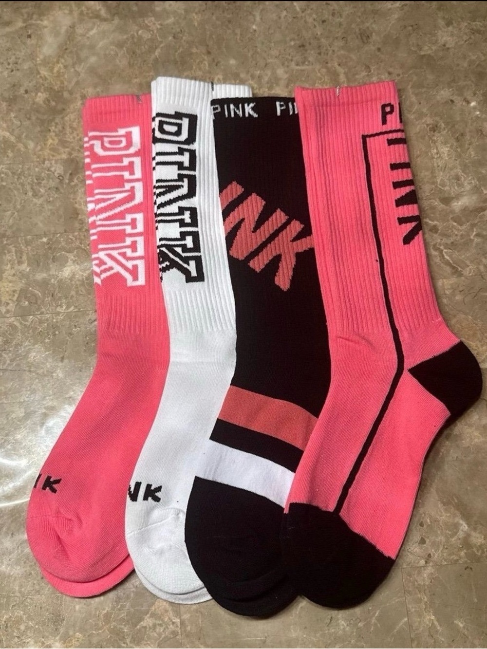 Pink Victoria’s Secret Socks
New Pink socks 
4 pairs included
Different styles